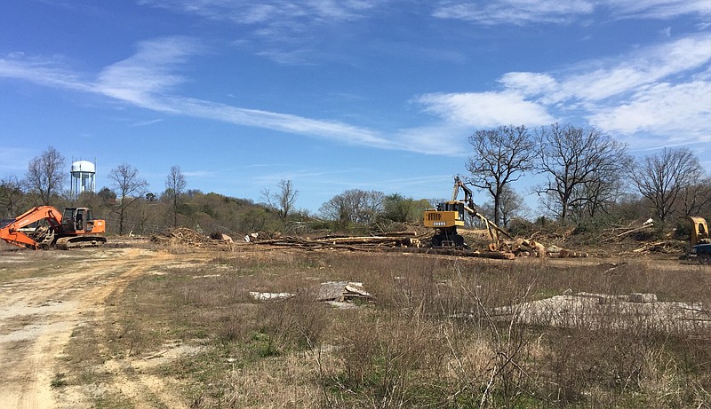 Construction crews clear site for Wal-Mart store planned at Highway 58 and North Hickory Valley Road. Wal-Mart bought more than 21 acres last month for the new store.
