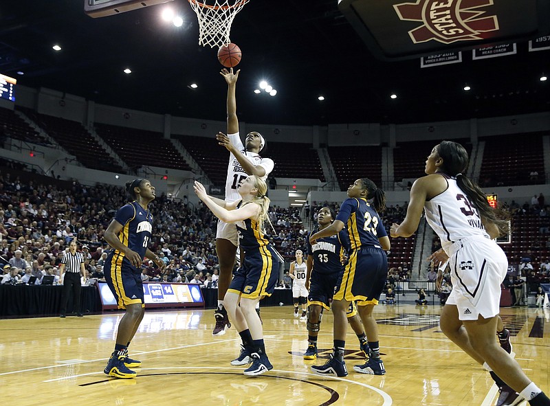 Mississippi State center Teaira McCowan (15) attempts a hook shot over UTC players during the first half in a first-round women's college basketball game in the NCAA Tournament on Friday, March 18, 2016, in Starkville, Miss. 