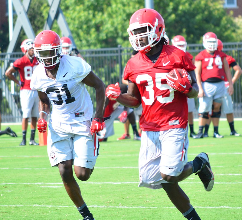 Former Georgia running back A.J. Turman, shown here practicing last August, was given his release this past week but was not allowed to transfer to Florida or Miami.