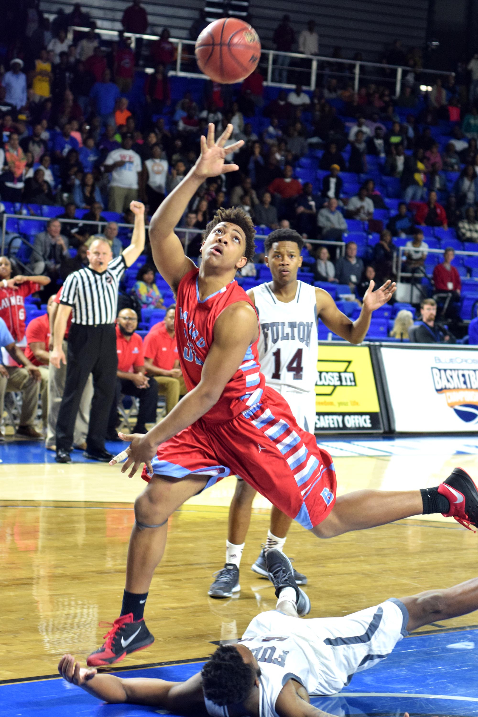 Brainerd's Jesse Walker (32) puts up a shot but is called for charging on this play. The Brainerd High Panthers faced the Fulton High Falcons in the TSSAA State Division I Class AA Championship at the Murphy Center on the campus of Middle Tennessee State University in Murfreesboro March 19, 2016.