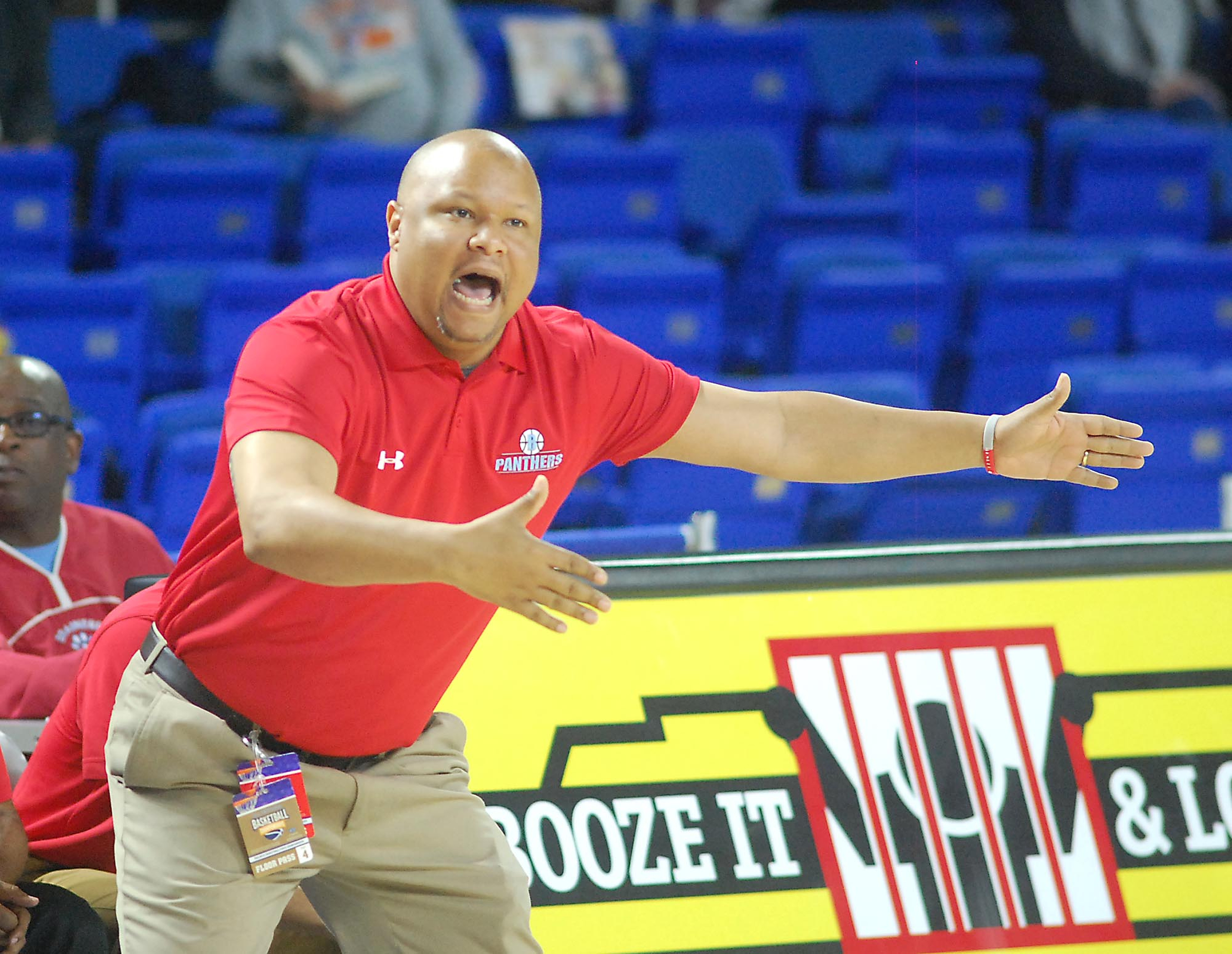 Head coach Levar Brown directs the Panthers from the bench. The Brainerd High Panthers faced the Fulton High Falcons in the TSSAA State Division I Class AA Championship at the Murphy Center on the campus of Middle Tennessee State University in Murfreesboro March 19, 2016.