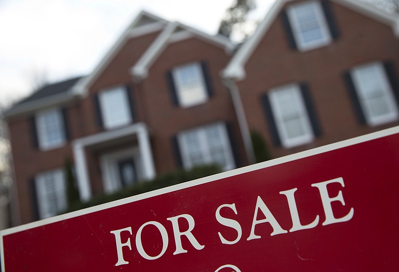 
              FILE - This Thursday, Dec. 3, 2015 file photo shows an existing home for sale in Roswell, Ga. On Monday, March 21, 2016, the National Association of Realtors reports on sales of existing homes in February. (AP Photo/John Bazemore, File)
            