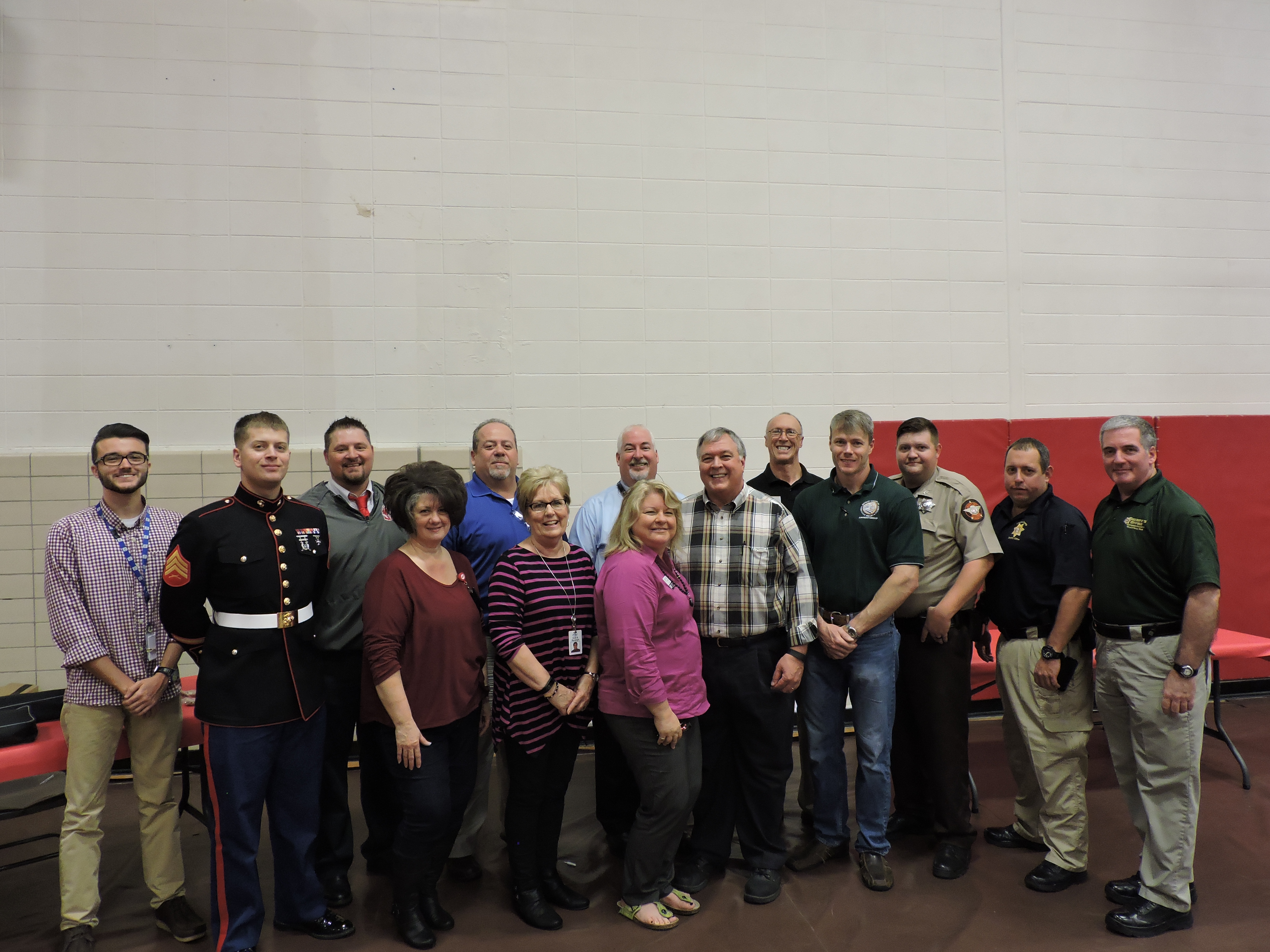 From left are CADNET TVA Supervisor Alex Anderson, U.S. Marine Corps Sgt. Joseph Garcia, LFO Work-based Learning Coordinator/head football coach Bo Campbell, McKee Foods Corp.'s Rhonda Wellborn, Local Union 43's Larry Morrison, McKee Foods' Vicki Randolph, Food City manager Bill Abline, Primary Health Care Center's Sandy Matheson, National Boiler Services' Larry Brown, Ironworkers Local 704's Brent Chambers, Catoosa County Sheriff's Office Deputy Stephen Cheatham, Catoosa County Sheriff's Office Cpl. Jake Hollis and Sgt. George Walton.