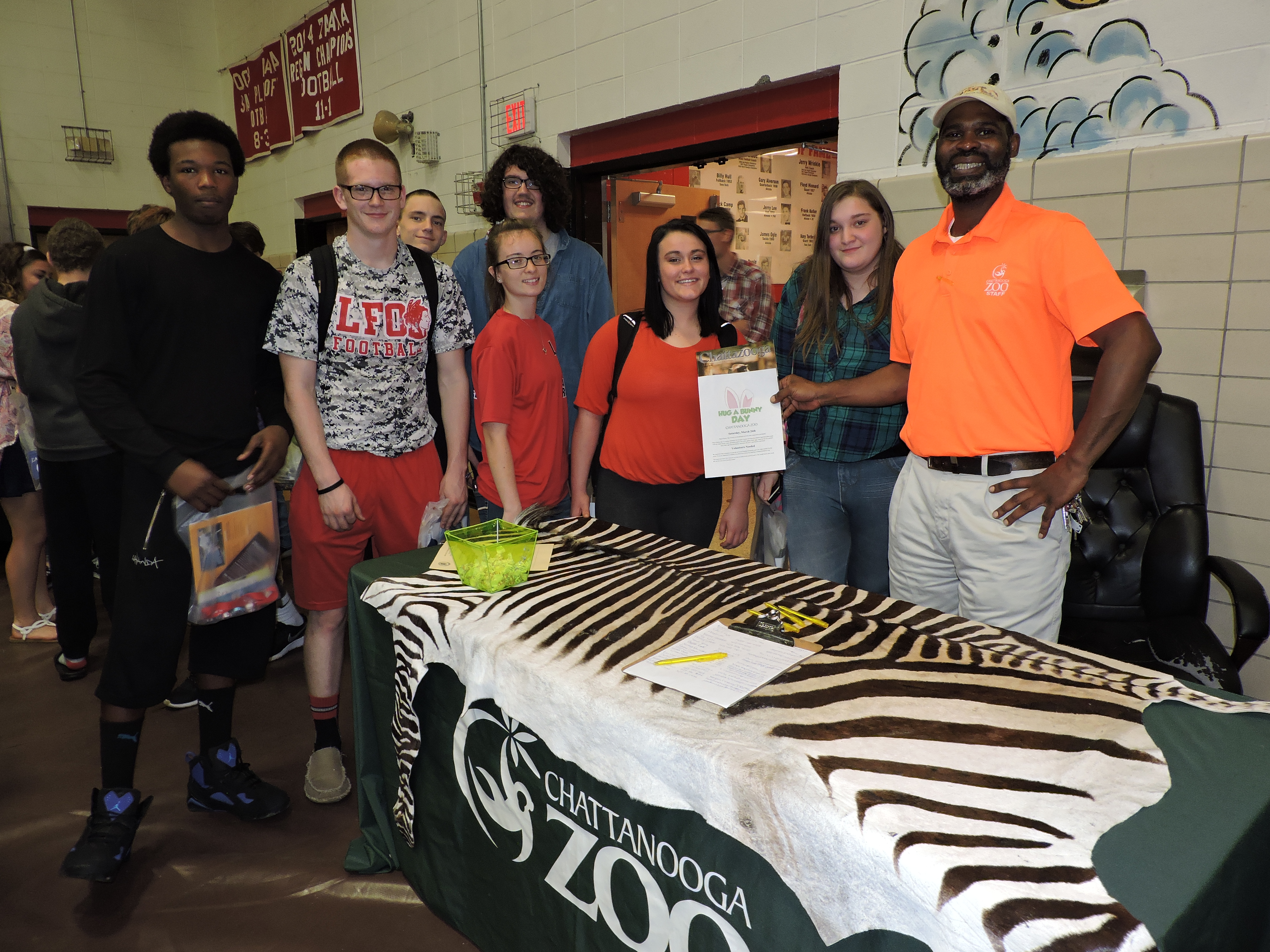 Lakeview-Fort Oglethorpe High School sophomores Kechone Scott, Johnathan Cutcher, Chance Burden, James Webb, Autumn Christian, Maddie Worley and Christina Deland, from left, meet with Chattanooga Zoo Director of Community Engagement James Brantley.