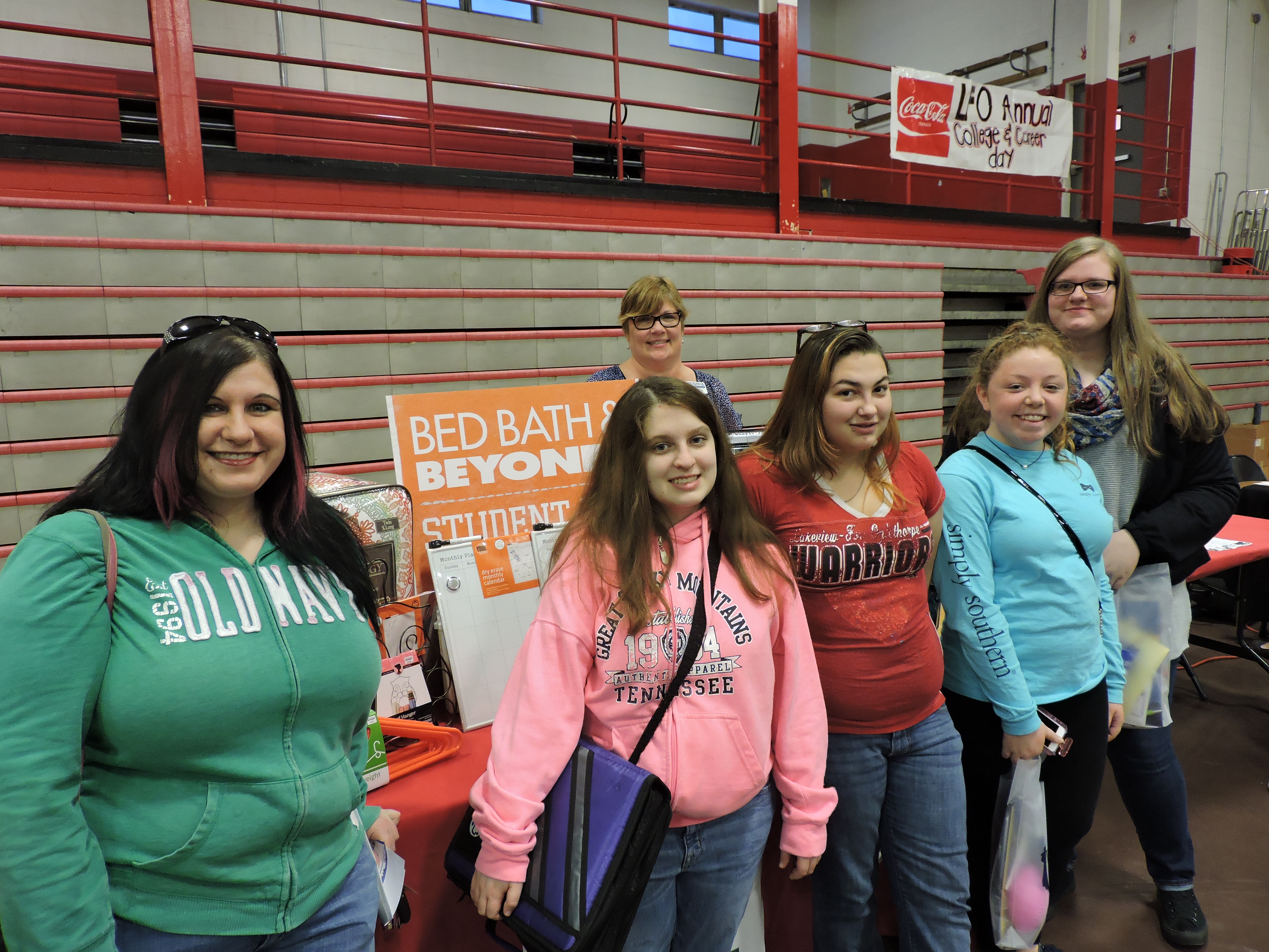 Rhonda Doran, Bed, Bath & Beyond of Hamilton Place Mall District trainer, in back, talks to students about careers at the store. From left are Michell McCorkle, her daughter, senior Candace Gooch, and sophomores Katie Winters, Bailee Meredith and Bailey Evett.