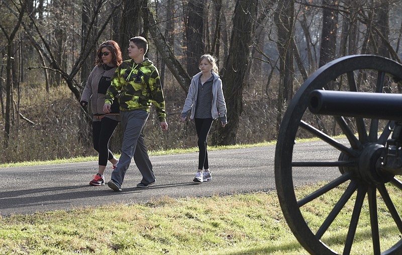 Miranda, Dawson and Katieann Thompson, from left, enjoy a walk at the Chickamauga Battlefield.