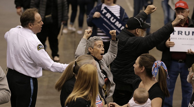 People protest against Republican presidential candidate Donald Trump at a recent campaign rally in Cleveland, Ohio.