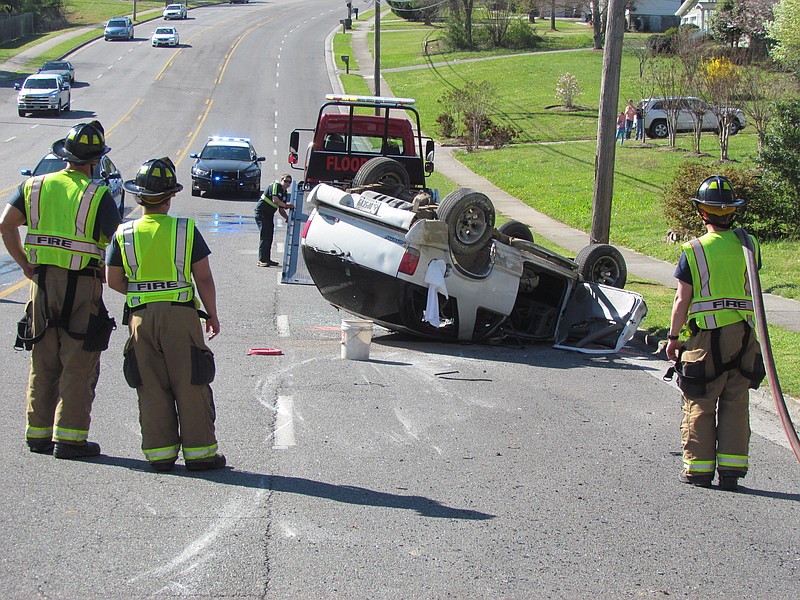 A GMC Jimmy was flipped on its side in a car wreck on Waugh Street.