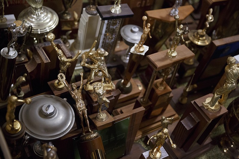 Joanne Kramer is sorting and organizing three storage rooms of memorabilia from Chattanooga High School. Decades-old trophies from baseball, track and basketball teams fill boxes in what is known as "The Archives."