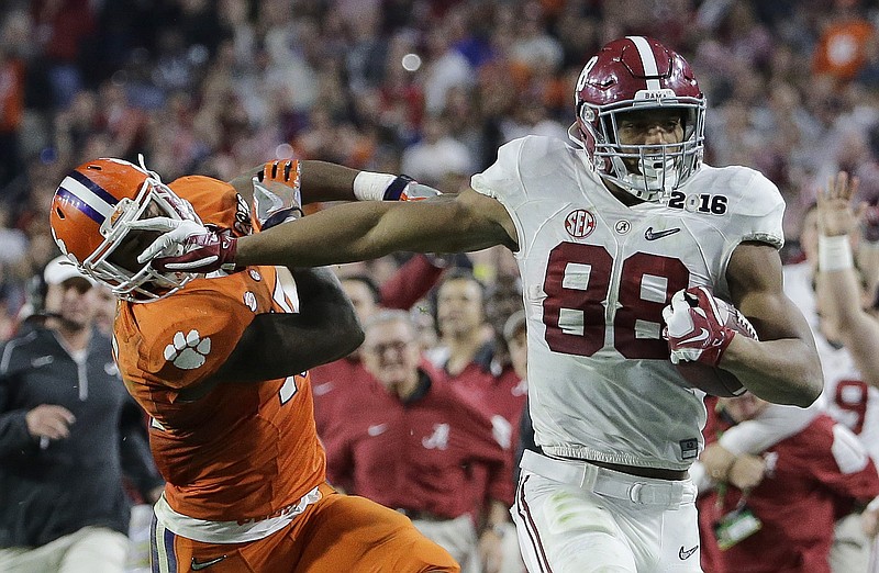Alabama tight end O.J. Howard, who had five catches for 208 yards and two touchdowns in January's win over Clemson in the national title game, said he came back for his senior season because he had more to accomplish in college.