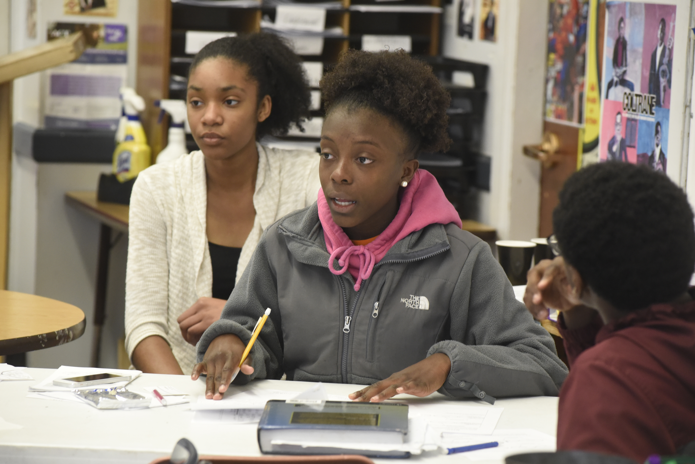 Kianes (CQ) Mines, center, participates with other members of her group as Chattanooga School for the Arts and Sciences students discuss Chattanooga 2.0 during their 11th grade seminar class Wednesday, Mar. 23, 2016, in Chattanooga, Tenn.