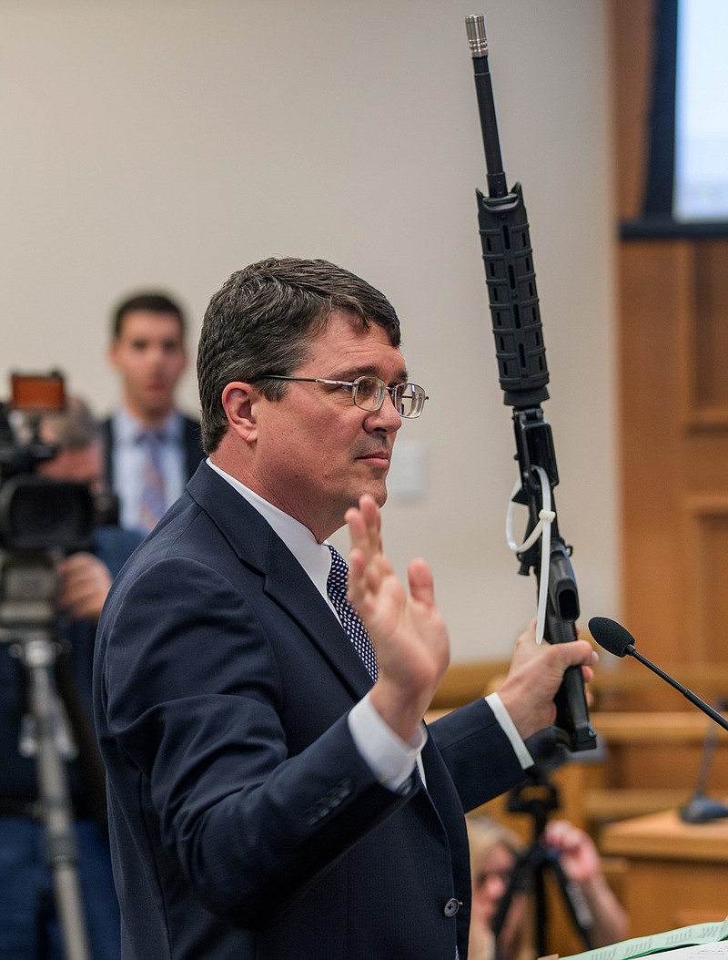 
              State Rep. Mike Stewart, D-Nashville, shows a gun he bought without a background check to the House Civil Justice subcommittee in Nashville, Tenn., on Wednesday, March 23, 2016. The committee later defeated Stewart’s bill seeking to require background checks for all gun purchases in Tennessee. (AP Photo/Erik Schelzig)
            