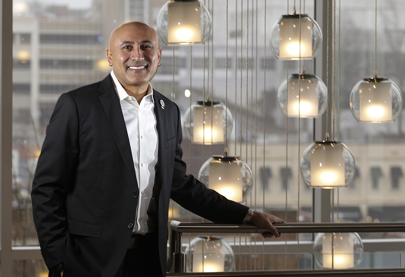 Staff Photo by Dan Henry / The Chattanooga Times Free Press- 2/23/16. Mitch Patel, Founder, President and CEO of Vision Hospitality Group, Inc., speaks about his rise to developing the successful award winning hotel chain on Tuesday, February 23, 2016, while in his office in downtown Chattanooga. 