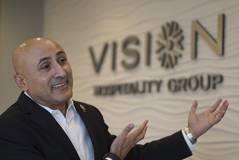 Staff Photo by Dan Henry / The Chattanooga Times Free Press- 2/23/16. Mitch Patel, Founder, President and CEO of Vision Hospitality Group, Inc., speaks about his rise to developing the successful award winning hotel chain on Tuesday, February 23, 2016, while in his office in downtown Chattanooga. 