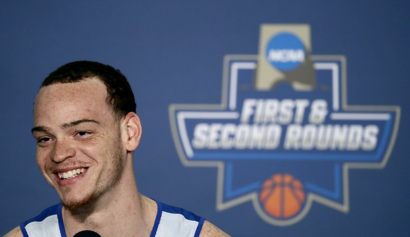 Middle Tennessee's Reggie Upshaw speaks to members of the media during a news conference ahead of a second-round men's college basketball game in the NCAA Tournament, Saturday, March 19, 2016, in St. Louis. Middle Tennessee plays Syracuse on Sunday. (AP Photo/Charlie Riedel)