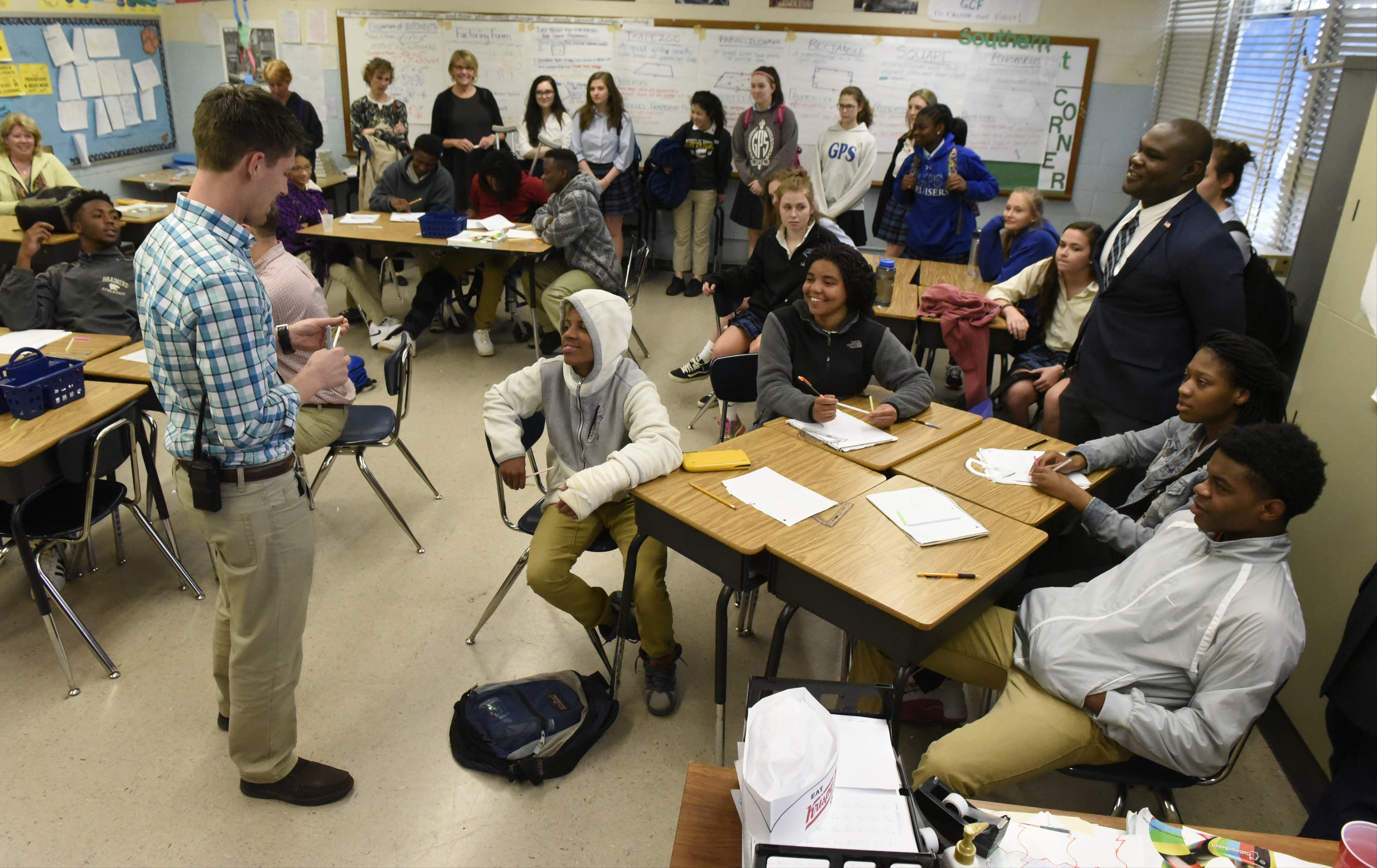 Students from a social justice class at the Girls Preparatory School drop in on instructor Jake Davis's 10th grade geometry class as they visit Brainerd High School on Thursday, Mar. 24, 2016, in Chattanooga, Tenn.
