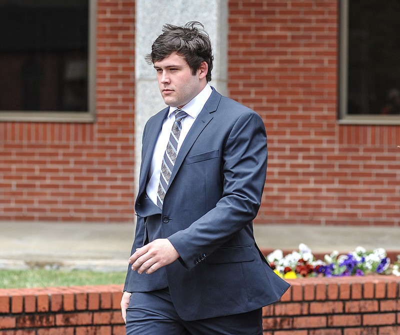 Former University of Mississippi student Austin Reed Edenfield leaves federal court Thursday, March 24, 2016, after pleading guilty to placing a noose on the school's statue of its first black student, in Oxford, Miss. Edenfield waived indictment and pleaded guilty to a misdemeanor charge before U.S. District Judge Michael Mills.