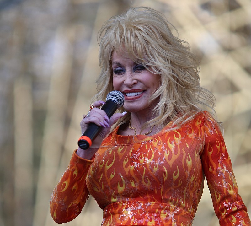 Dolly Parton speaks about a new roller coaster and her new album "Pure and Simple" while at Dollywood on March 25, 2016.