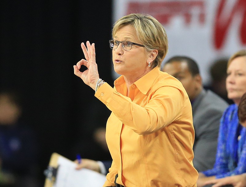 Tennessee coach Holly Warlick calls a play during a women's college basketball regional semifinal against Ohio State in the NCAA Tournament in Sioux Falls, S.D., Friday, March 25, 2016. (AP Photo/Nati Harnik)