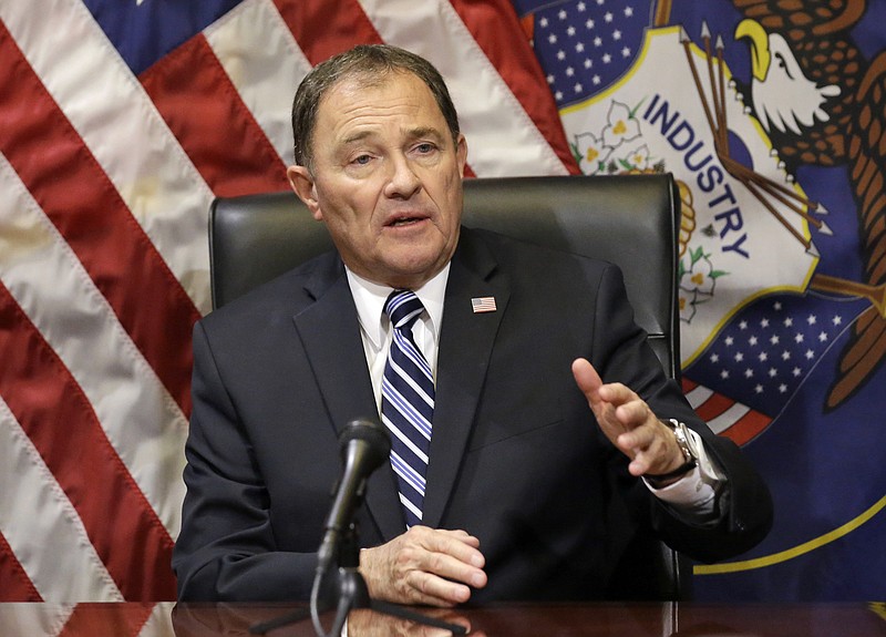 
              FILE - In this Feb. 17, 2016 file photo, Utah Gov. Gary Herbert speaks with reporters during a news conference at the Utah State Capitol, in Salt Lake City. The governor signed a bill Monday, March 28, 2016, that makes Utah the first state to require doctors to give anesthesia to women having an abortion at 20 weeks of pregnancy or later. The bill signed by Republican Gov. Herbert is based on the disputed premise that a fetus can feel pain at that point. (AP Photo/Rick Bowmer, File)
            