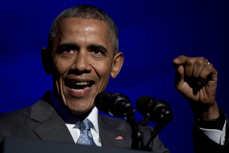 
              President Barack Obama speaks during the awards dinner for Syracuse University’s Toner Prize for Excellence in Political Reporting at Andrew W. Mellon Auditorium, in Washington, Monday, March 28, 2016. (AP Photo/Carolyn Kaster)
            