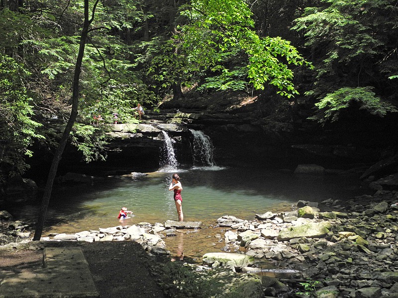 Jun 9, 2012-- Hikers enjoy the swimming hole on the Fiery Gizzard Trail, which is part of the South Cumberland State Park.
