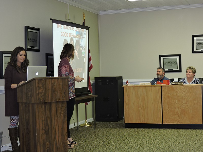 Part of the BOE's normal business each month is a report from a local school. North LaFayette Elementary School special education teachers Brandy Beavers, left, and Rachel Fahrney inform Walker County Board of Education members about some of the school's initiatives.The school is rewarding positive behaviors and setting clear expectations, they said. Students practice being Rambler Ready by being respectful, responsible and safe. A golden plunger is awarded to the cleanest area of the school. Students receive reward baskets for good behavior. The students perform a cheer called "Rambler Roll."