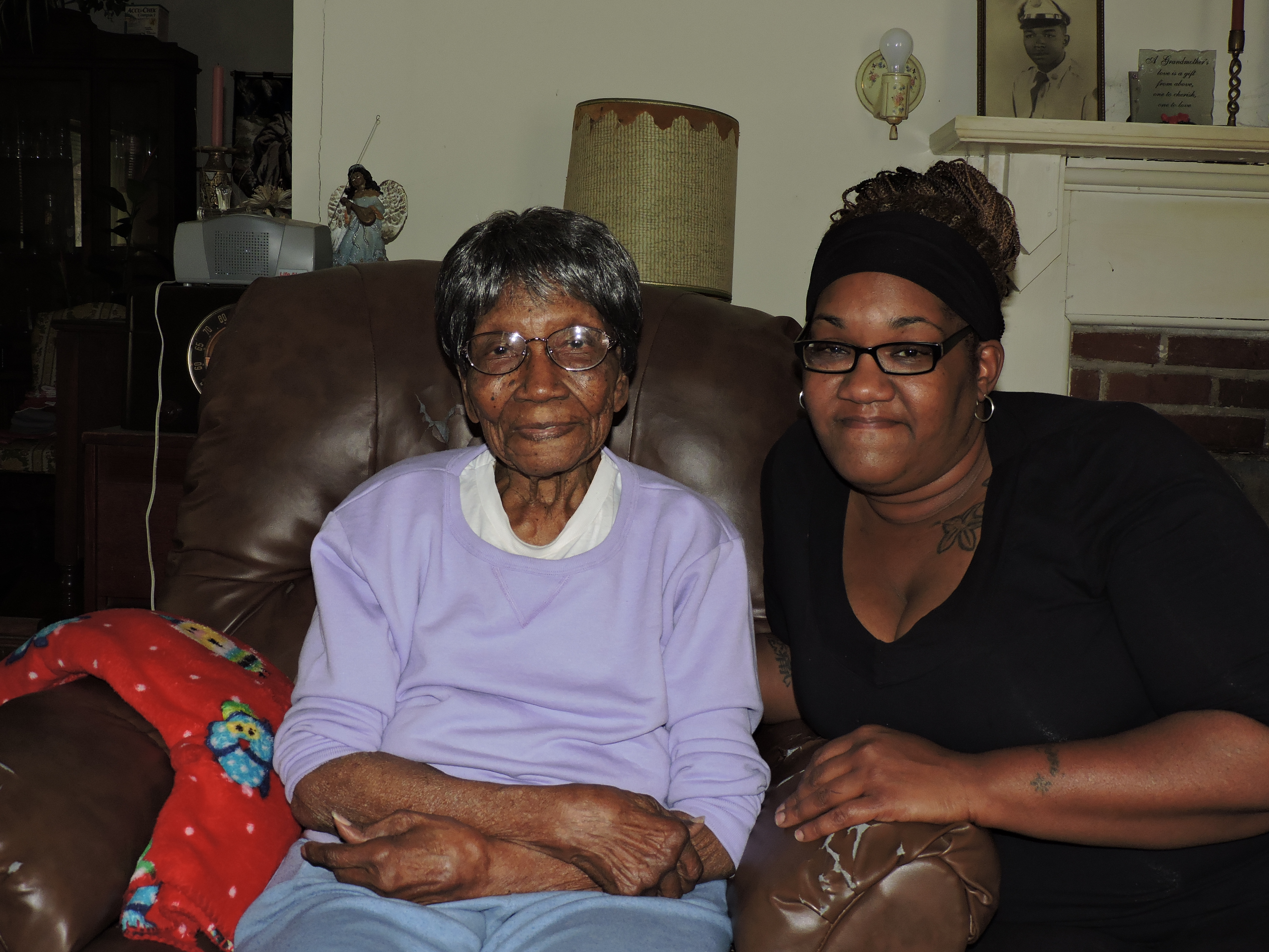 On Jerrel Dean Hudgins' recent 100th birthday, her grandchildren, including granddaughter Neko Hudgins, helped her count and read her 160 birthday cards. Jerrel Dean Hudgins' 21-year-old great-granddaughter Deairika, who lives with her in Chickamauga, shares her birthday.