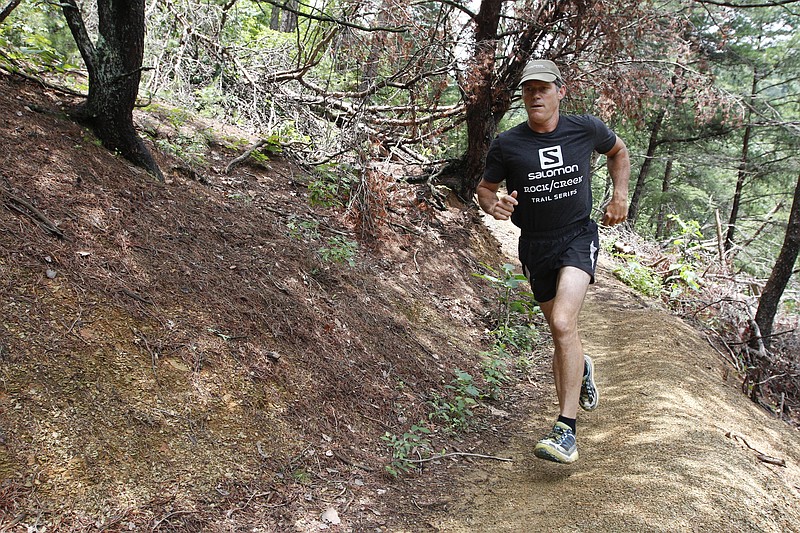Randy Whorton runs on a trail on Stringers Ridge. The city of Red Bank is extending its agreement with the Trust for Public Land to build two trail extensions on Stringer's Ridge, which will connect Stringer's Ridge Park in Chattanooga to White Oak Park in Red Bank.
