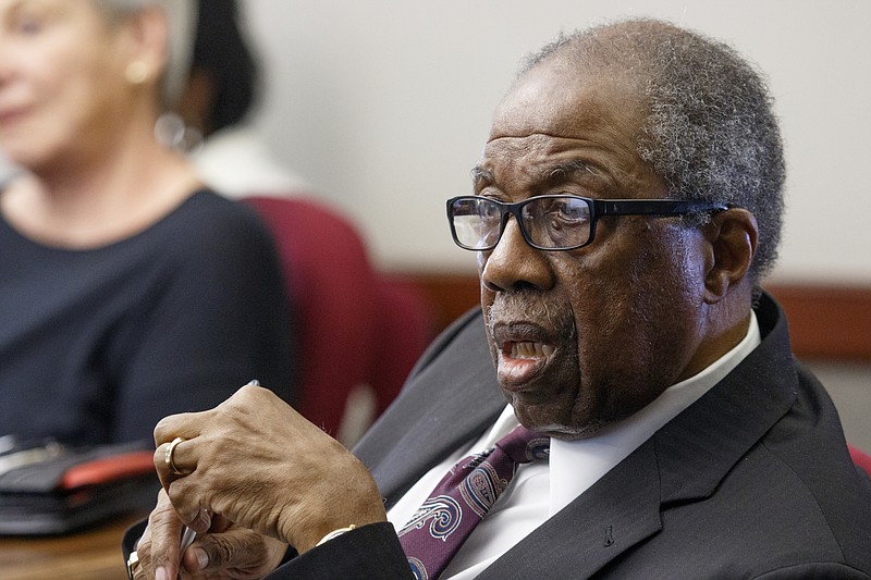 Chattanooga City Councilman Moses Freeman listens to a presentation on the city's wastewater infrastructure during an afternoon agenda session at the City Council building Tuesday, March 29, 2016, in Chattanooga, Tenn. The council voted Tuesday to withdraw its subpoena of District Attorney Neal Pinkston, which the council issued after Pinkston's refusal to appear before the council to discuss the city's violence reduction initiative.