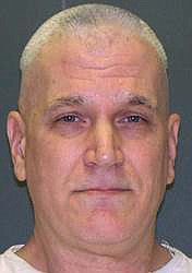 
              This undated handout photo provided by the Texas Department of Criminal Justice shows John David Battaglia. Enraged over his ex-wife going to police about his repeated harassment and likely arrest, Battaglia used a May 2001 visit with their two young daughters to avenge his anger. As their mother helplessly listened on the phone to one of the girls’ cries, he fatally shot them both at his Dallas apartment. On Wednesday, March 30, 2016, Battaglia is set for lethal injection for the slayings. (Texas Department of Criminal Justice via AP)
            