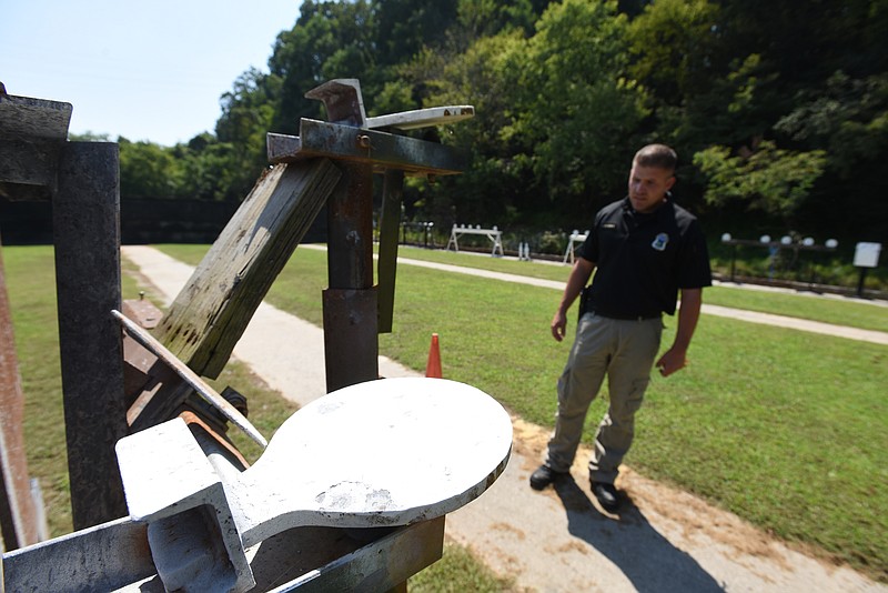 Officer Joe Sabba talks about the poor state of the range Thursday, September 3, 2015 at the police firing range on Moccasin Bend Road.