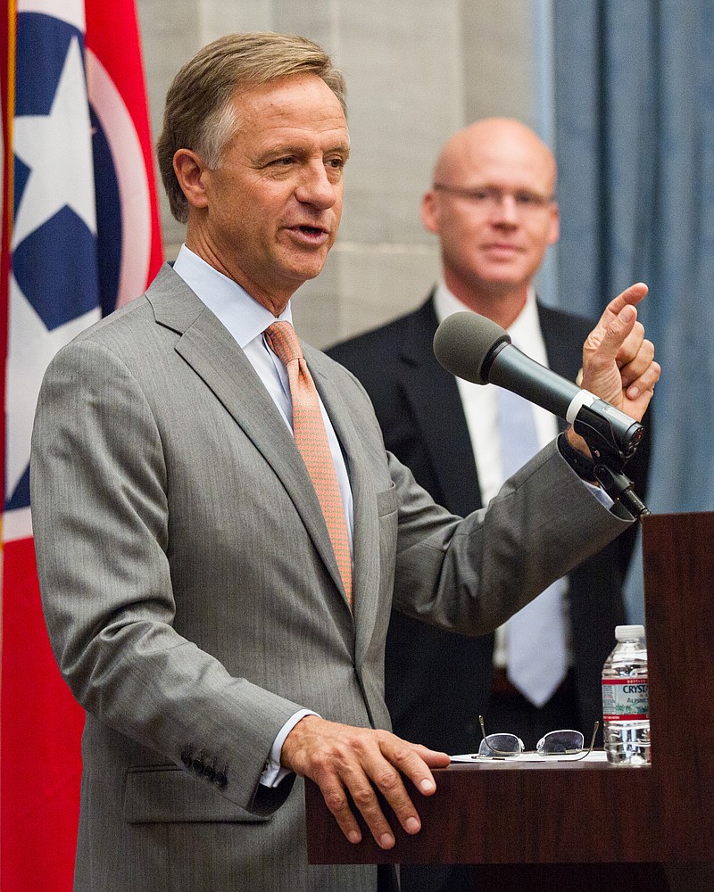
              Tennessee Gov. Bill Haslam announces the retirement plans of TennCare Director Darin Gordon, right, during a press conference at the state Capitol in Nashville, Tenn., on Wednesday, March 30, 2016. Before Gordon’s tenure, the state expanded Medicaid program had 10 directors in 12 years. (AP Photo/Erik Schelzig)
            