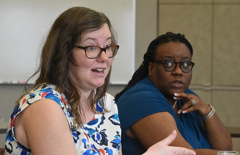 UnifiEd Executive Director Elizabeth Crews , left, and deputy executive director Lakweshia Ewing speak about public education during a meeting with the Chattanooga Times Free Press editorial board in August 2015.