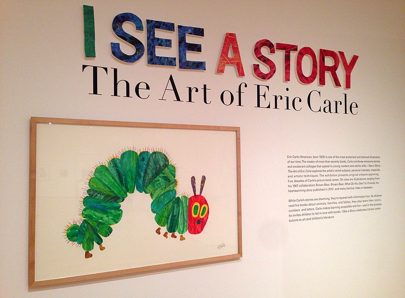 
              In this March 30, 2016 photo, a large-format collage from "The Very Hungry Caterpillar" by children's book author and illustrator Eric Carle greets visitors to an exhibition of Carle's work at the High Museum of Art in Atlanta. The exhibition, "I See a Story: The Art of Eric Carle," opens Saturday, April 2  and runs thru Jan. 8. (AP Photo/Kate Brumback)
            