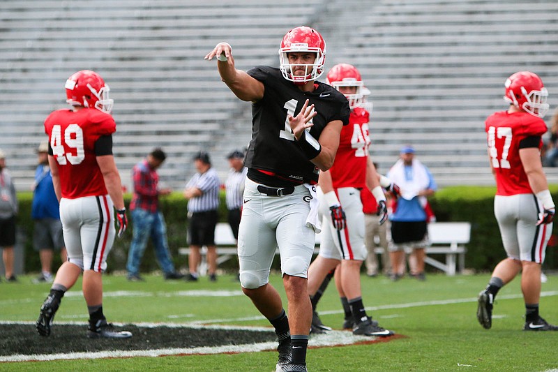 Georgia senior quarterback Greyson Lambert continues to do the best job of managing the huddle, first-year Bulldogs coach Kirby Smart said after Saturday's first spring scrimmage.