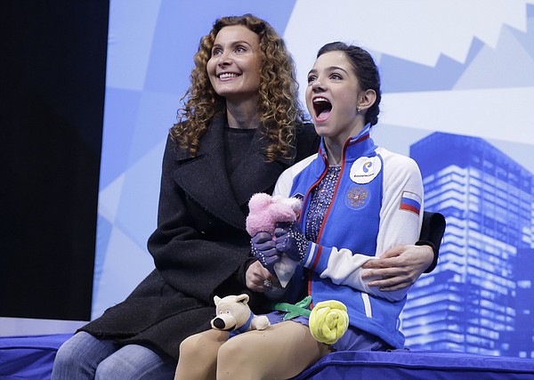 Medvedeva, 16, wins world title with record free skate score ...