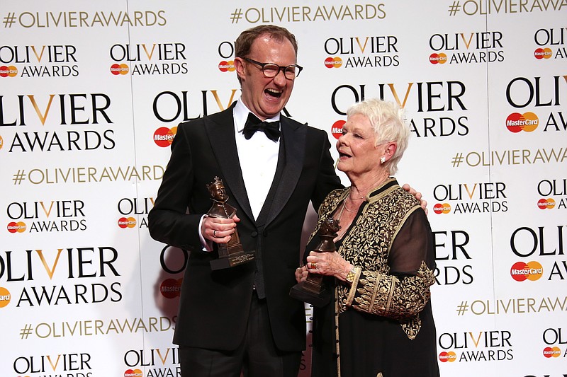 
              Actors Mark Gatiss, left, with his Best Actor in a Supporting Role award for his performance in the play 'Three Days in the Country' and Dame Judi Dench with her Best Actress in a Supporting Role award for her performance in the play 'The Winter's Tale' at the Olivier Awards in London, Sunday, April 3, 2016. (Photo by Joel Ryan/Invision/AP)
            