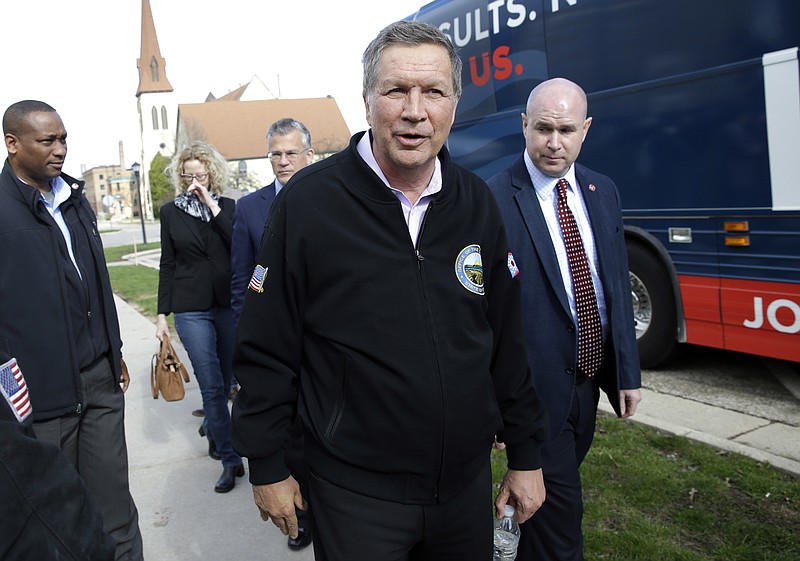 Republican presidential candidate, Ohio Gov. John Kasich leaves after his campaign stop at the Armory, Saturday, April 2, 2016, in Janesville, Wis. (AP Photo/Nam Y. Huh)