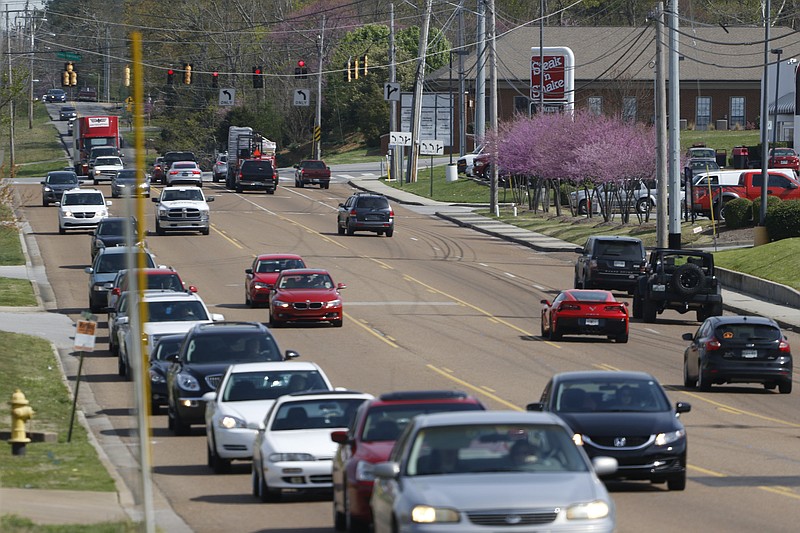 Staff Photo by Dan Henry / The Chattanooga Times Free Press- 3/30/16. Motorists travel along Gunbarrel Road on Thursday, March 31, 2016. 