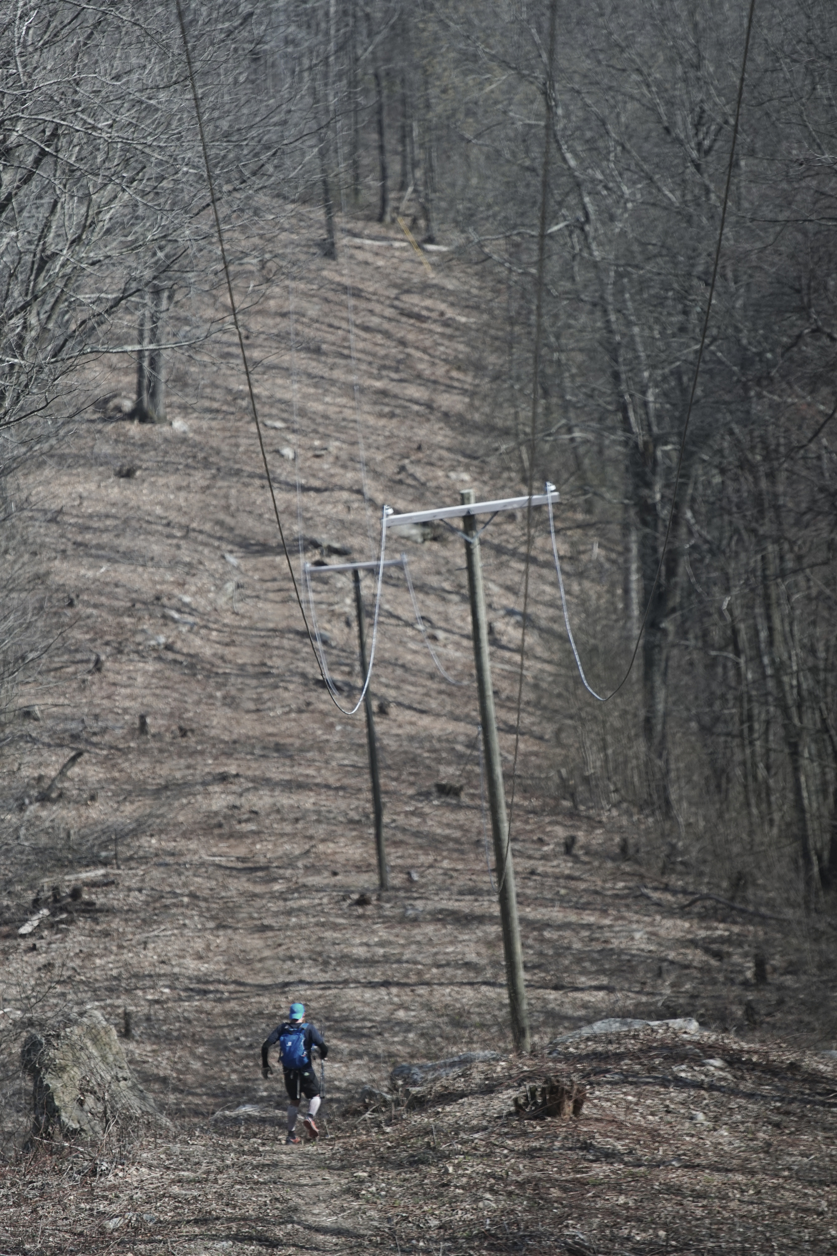 Staff Photo by Dan Henry / The Chattanooga Times Free Press- 4/4/16. Gary Robbins descends "Rat Jaw" from the Frozen Head Lookout Tower on his fifth loop where a water drop and braille book awaited during the 30th running of the Barkley Marathons at Frozen Head State Park in Warburg, Tenn., on April 4, 2016. Robbins completed four and a half loops before pulling himself from the race due hallucinations from lack of sleep. The Barkley Marathons is part orienteering, part ultra marathon where a select few attempt to complete up to five 20 mile loops within a 60-hour time limit where they search for hidden book caches deep in the woods throughout the park.