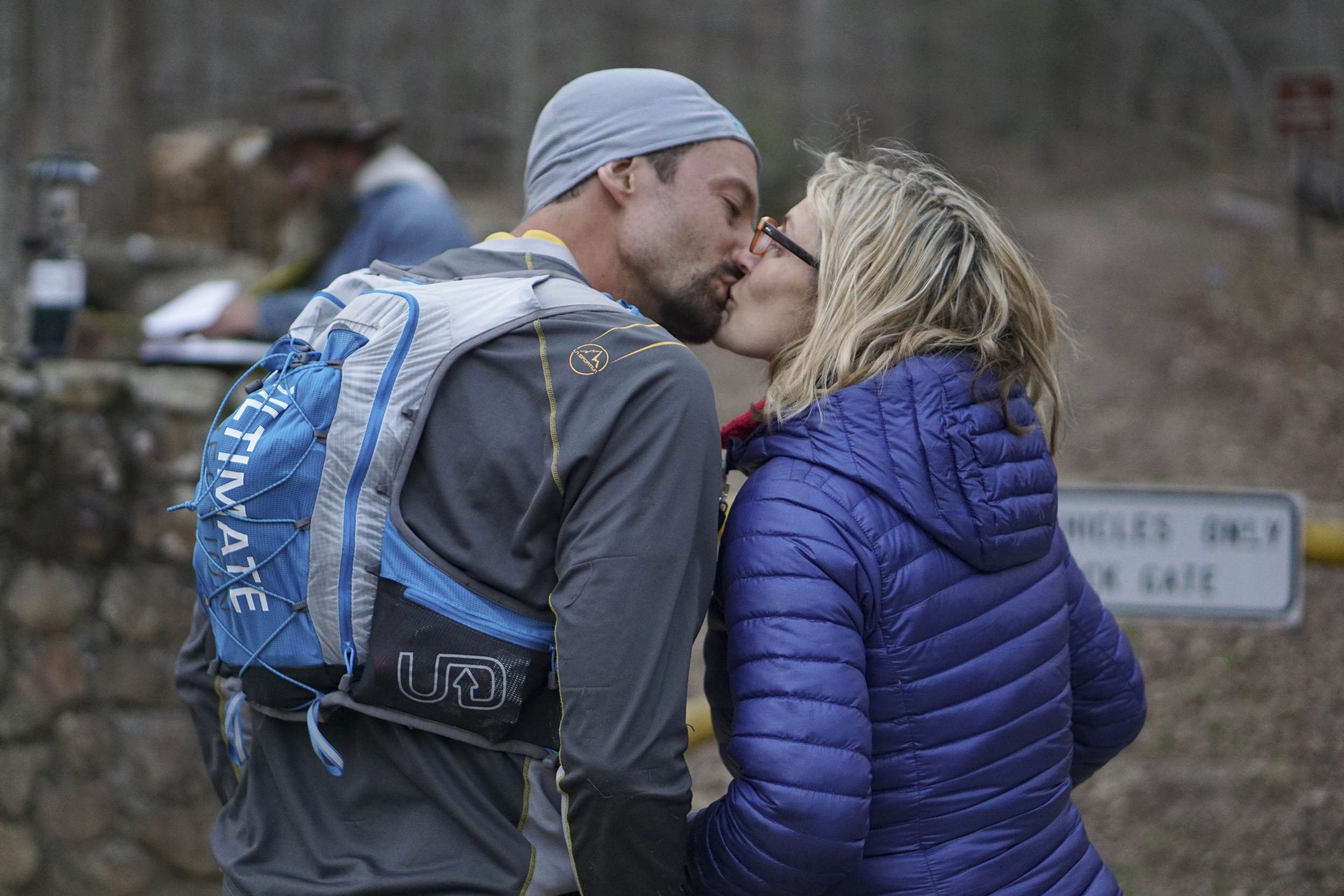 Staff Photo by Dan Henry / The Chattanooga Times Free Press- 4/4/16. Jared Campbell kisses his wife Mindy Campbell before heading out on his fourth loop during the 30th running of the Barkley Marathons at Frozen Head State Park in Warburg, Tenn., on April 3, 2016. Campbell completed the race earning the designation of the first person to ever finish three times. The Barkley Marathons is part orienteering, part ultra marathon where a select few attempt to complete up to five 20 mile loops within a 60-hour time limit where they search for hidden book caches deep in the woods throughout the park.