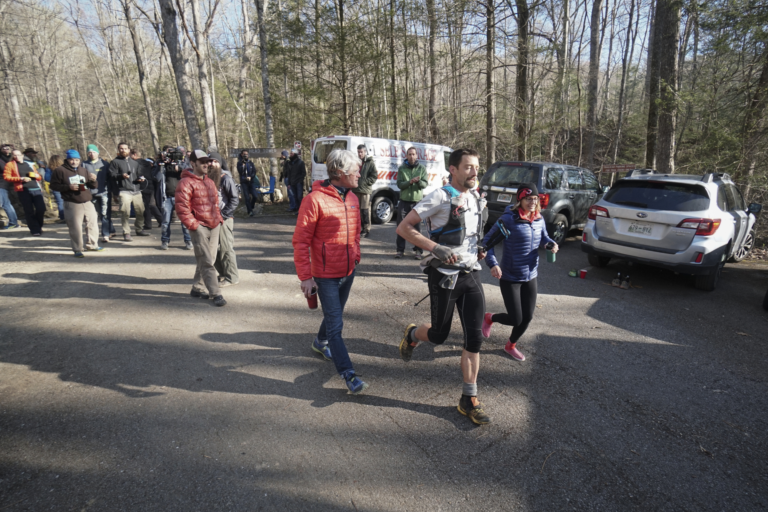 Staff Photo by Dan Henry / The Chattanooga Times Free Press- 4/4/16. Jared Campbell returns to the campsite from his fourth loop during the 30th running of the Barkley Marathons at Frozen Head State Park in Warburg, Tenn., on April 4, 2016. Campbell completed the race earning the designation of the first person to ever finish three times. The Barkley Marathons is part orienteering, part ultra marathon where a select few attempt to complete up to five 20 mile loops within a 60-hour time limit where they search for hidden book caches deep in the woods throughout the park.