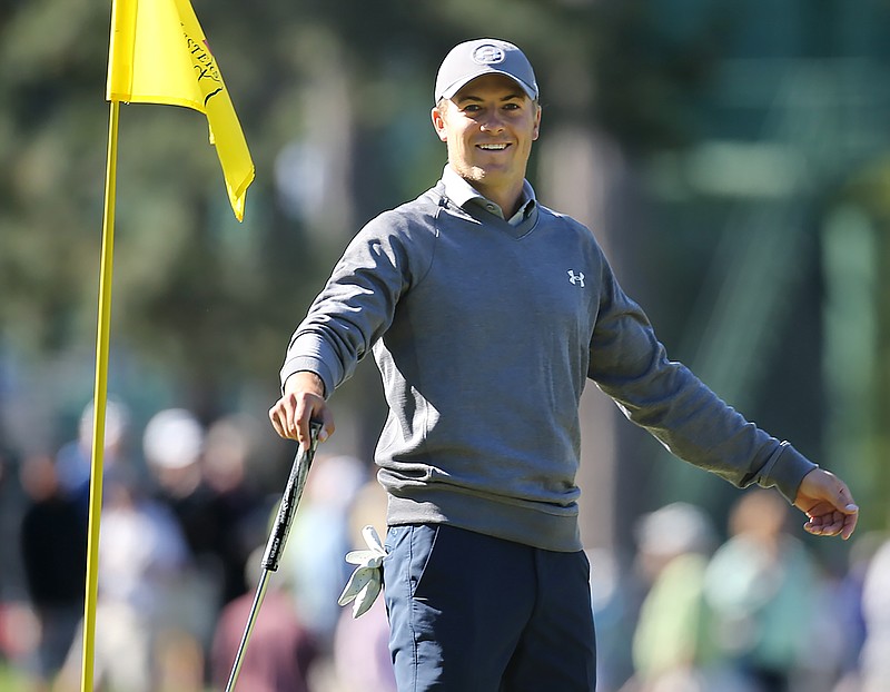 
              Masters defending champion Jordan Spieth smiles while putting on the third hole during a practice round for the Masters golf tournament in Augusta, Ga. Tuesday, April 5, 2016. (Curtis Compton/Atlanta Journal-Constitution via AP)  MARIETTA DAILY OUT; GWINNETT DAILY POST OUT; LOCAL TELEVISION OUT; WXIA-TV OUT; WGCL-TV OUT; MANDATORY CREDIT
            
