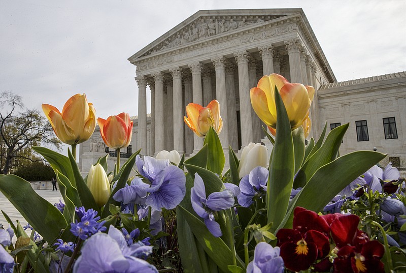 The Supreme Court is seen in Washington, Monday, April 4, 2016, after justices ruled in a case involving the constitutional principle of "one person, one vote" and unanimously upheld a Texas law that counts everyone, not just eligible voters, in deciding how to draw legislative districts.