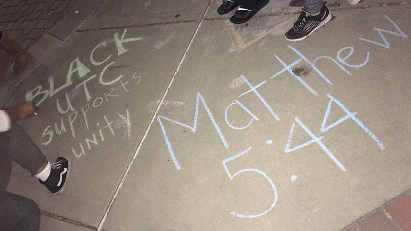 UTC students incensed at pro-Trump chalk drawings washed them away and replaced them with messages that said "Black UTC supports unity."