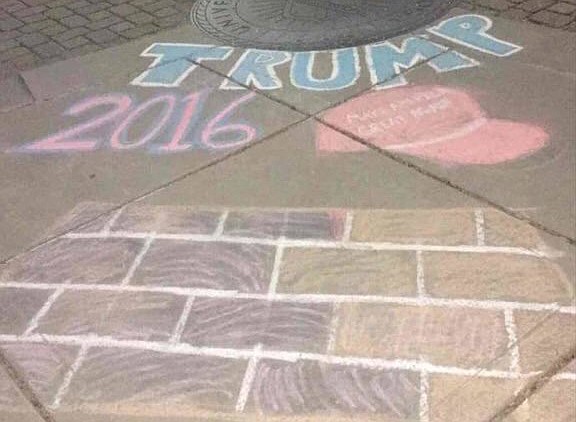 A UTC student was asked to resign her student government association post after making pro-Trump chalk drawings on the ground. 