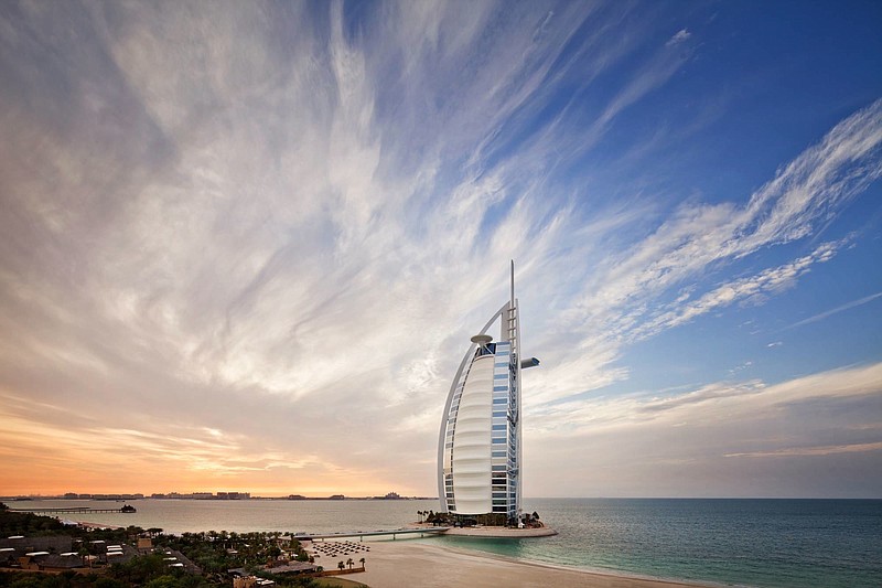 The distinctive sail-shaped silhouette of Burj Al Arab Jumeirah hotel is a symbol of modern Dubai.