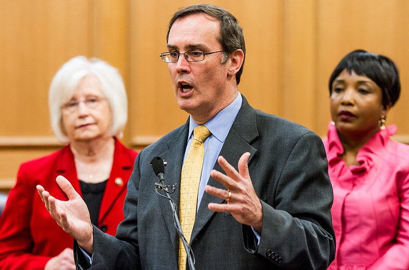 David Fowler, president of the Family Action Council of Tennessee, speaks at a press conference at Legislative Plaza in Nashville, Tenn., on Tuesday, March 5, 2013. Fowler spoke in favor of a bill to strip to Vanderbilt University of its police powers if it doesnt change its nondiscrimination policy for student groups. At rear are Republican Sen. Mae Beavers of Mt. Juliet, left,  and Vanderbilt professor Carol Swain. (AP Photo/Erik Schelzig)