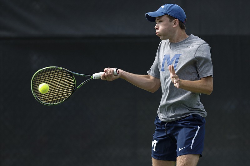 Staff Photo by Dan Henry / The Chattanooga Times Free Press- 4/8/16. McCallie School's Zan Meyer plays Jack Satterfield during the annual Rotary Tennis Tournament at the Baylor School tennis courts on April 8, 2016. 